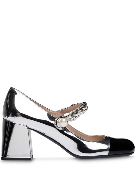 metallic technical fabric pumps|Metallic technical fabric and patent leather pumps.